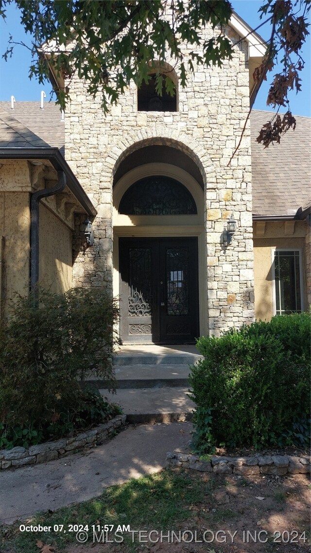 view of exterior entry with french doors