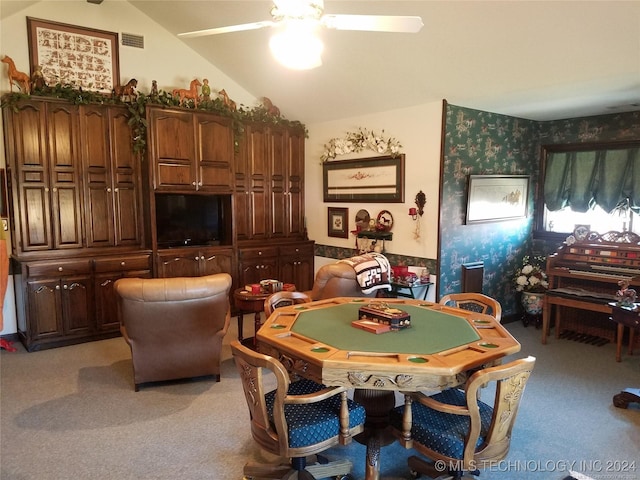 playroom featuring light carpet, ceiling fan, and vaulted ceiling