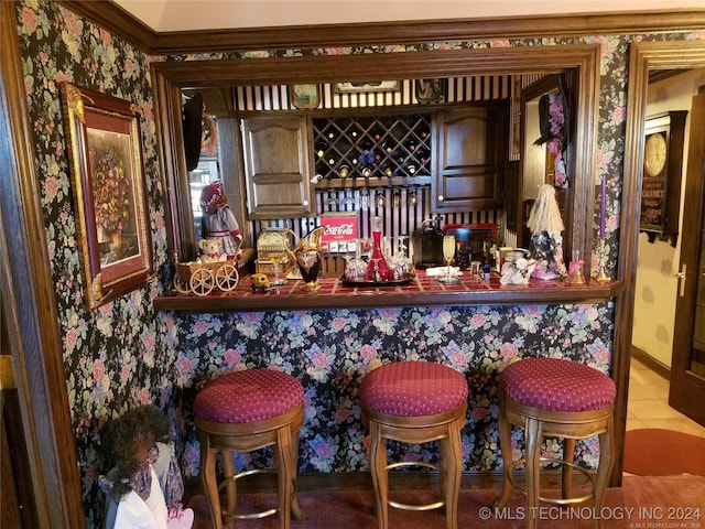 bar featuring light tile patterned flooring