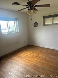 unfurnished room featuring light hardwood / wood-style flooring and ceiling fan