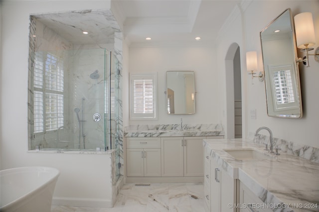 bathroom featuring vanity, independent shower and bath, and ornamental molding