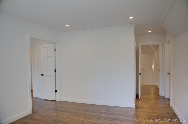 unfurnished room with crown molding and dark wood-type flooring