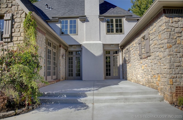 back of house with a patio