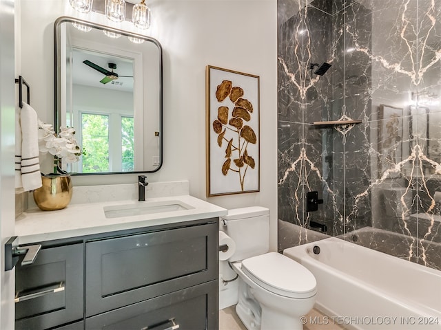 full bathroom featuring shower / tub combination, ceiling fan, vanity, and toilet