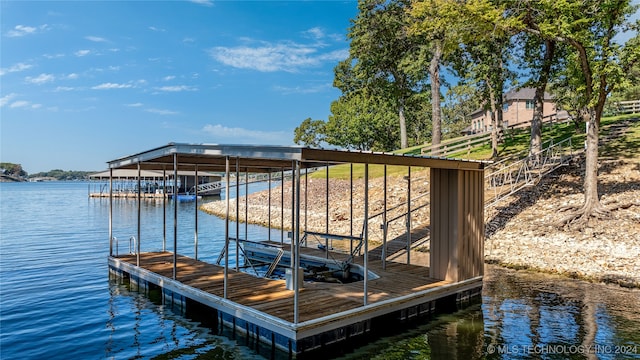 view of dock with a water view