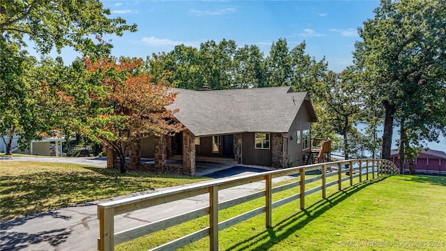 view of front of property with a front lawn