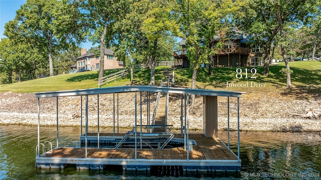 dock area with a water view