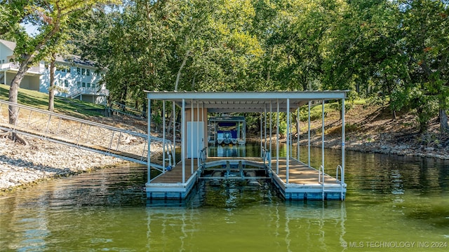 view of dock with a water view