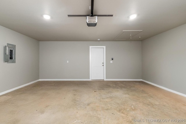 garage featuring a garage door opener and electric panel