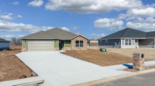 view of front of home with a garage