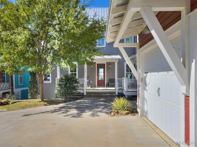 86 Ridgeline, Carlton Landing, OK 74432 - doorway to property featuring a porch
