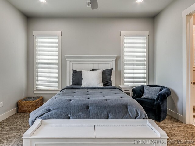 86 Ridgeline, Carlton Landing, OK 74432 - bedroom with visible vents, baseboards, carpet flooring, and multiple windows