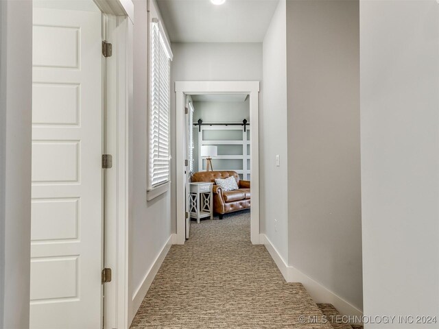 86 Ridgeline, Carlton Landing, OK 74432 - hallway featuring carpet flooring and baseboards