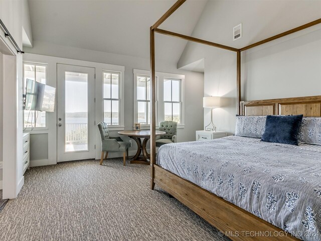 86 Ridgeline, Carlton Landing, OK 74432 - carpeted bedroom with lofted ceiling, access to exterior, and visible vents