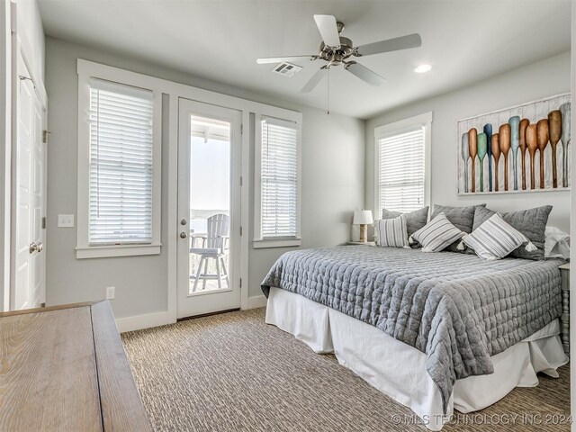 86 Ridgeline, Carlton Landing, OK 74432 - carpeted bedroom with visible vents, a ceiling fan, baseboards, and access to outside
