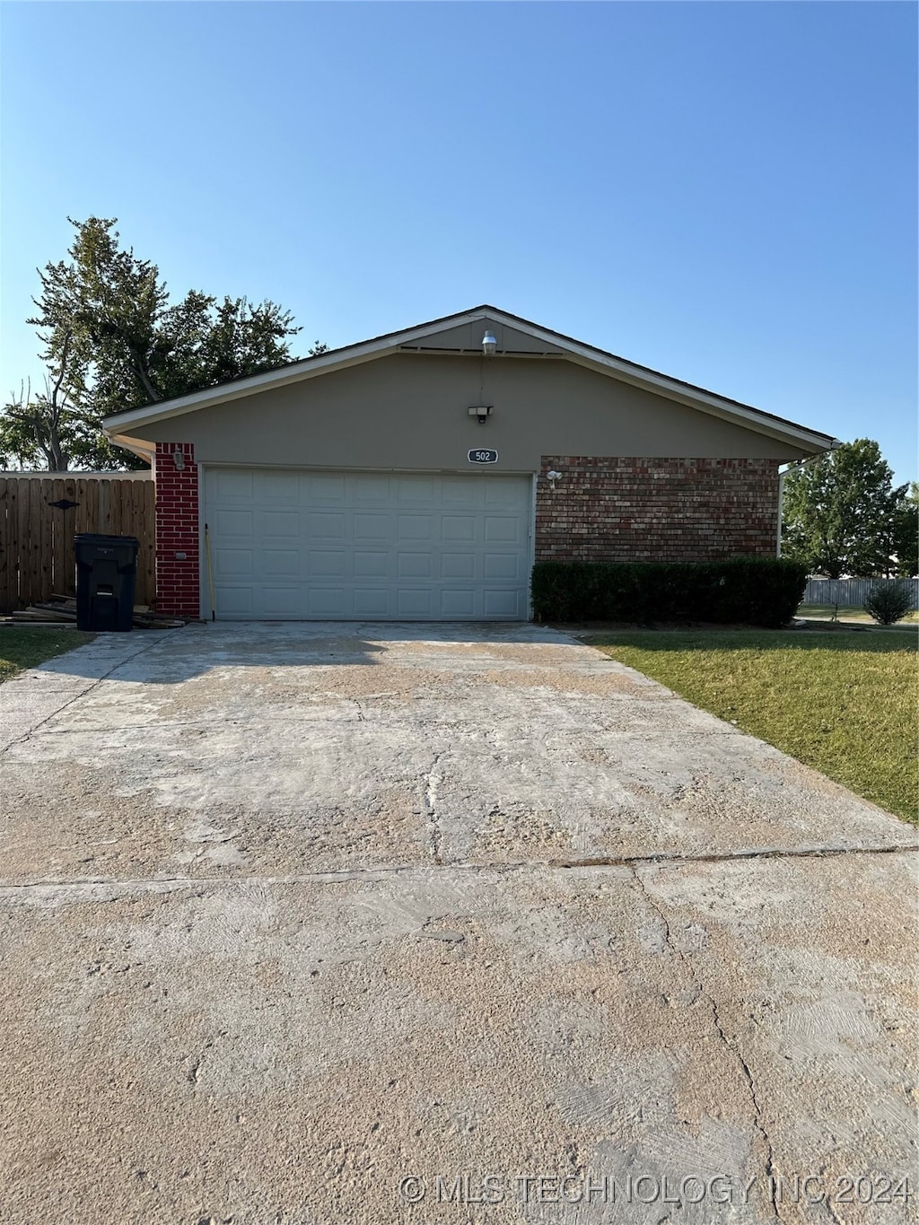 view of property exterior with a garage