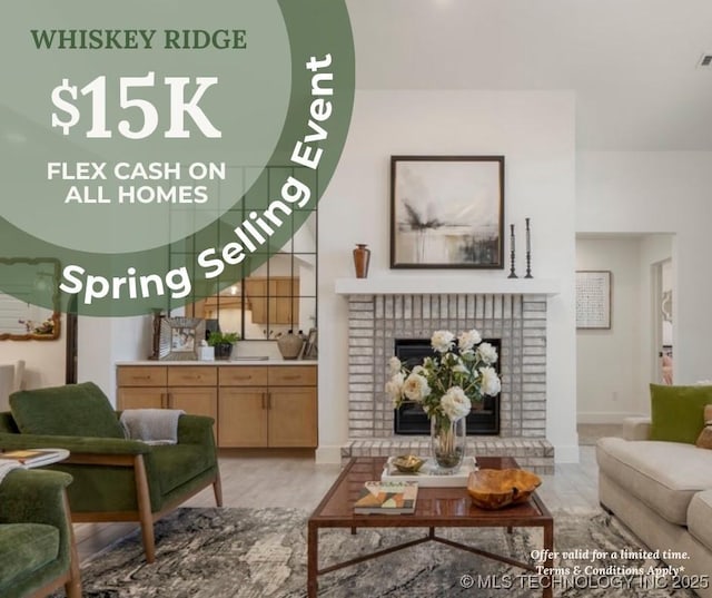 2804 E Northampton St, Broken Arrow, OK 74014 - living room featuring a brick fireplace and baseboards