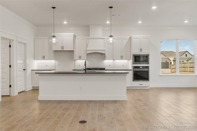 2804 E Northampton St, Broken Arrow, OK 74014 - kitchen with stainless steel appliances, a sink, dark countertops, white cabinetry, and crown molding