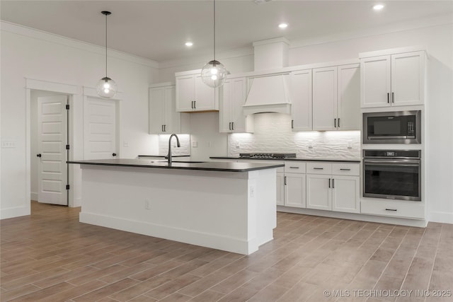 2804 E Northampton St, Broken Arrow, OK 74014 - kitchen with oven, a sink, dark countertops, built in microwave, and crown molding
