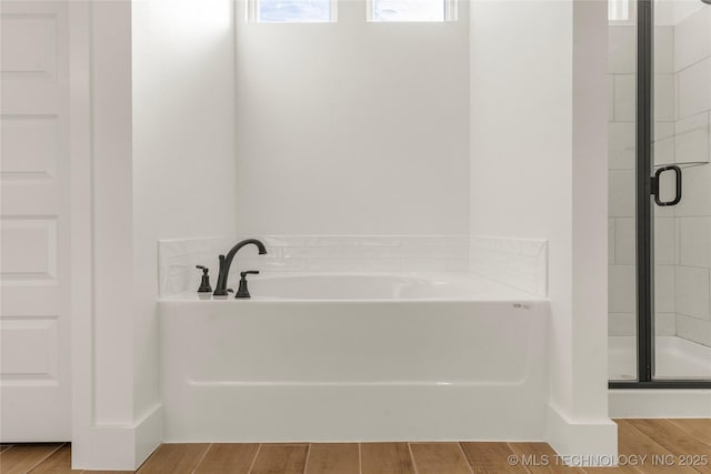 2804 E Northampton St, Broken Arrow, OK 74014 - full bath featuring a shower stall, a garden tub, and wood finished floors