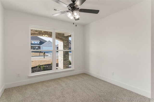 2804 E Northampton St, Broken Arrow, OK 74014 - spare room featuring carpet floors, baseboards, and a ceiling fan