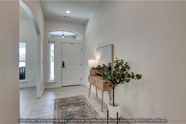 entryway with light hardwood / wood-style flooring