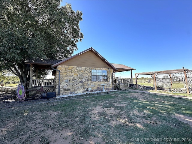 view of property exterior with stone siding