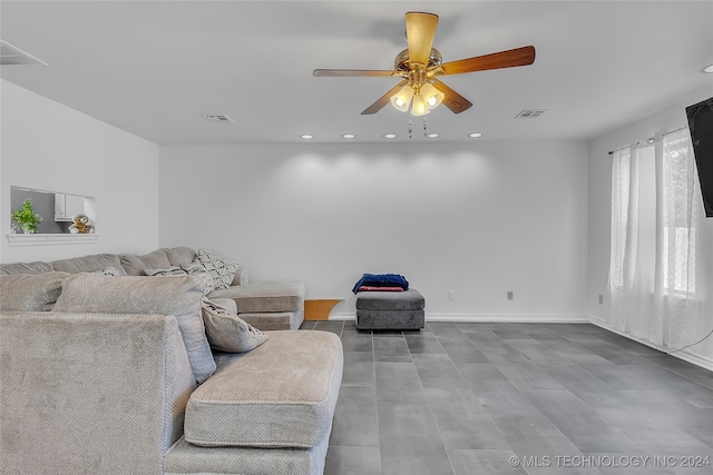 living room with ceiling fan