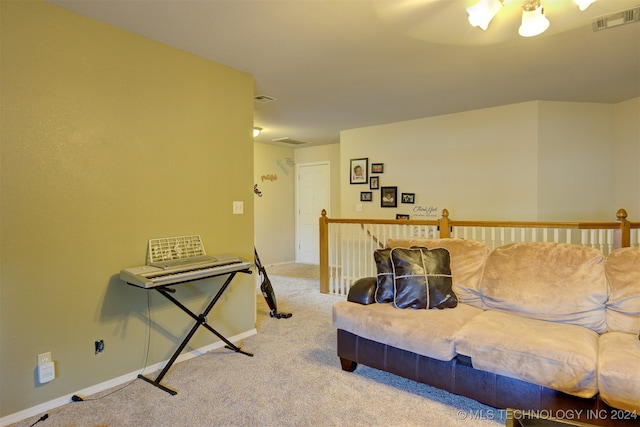 living room featuring light carpet