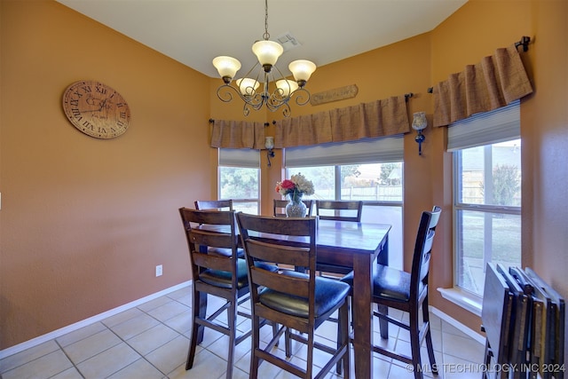 tiled dining area with radiator and a chandelier