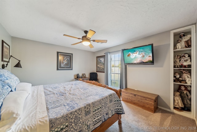 bedroom featuring carpet flooring, baseboards, and a ceiling fan