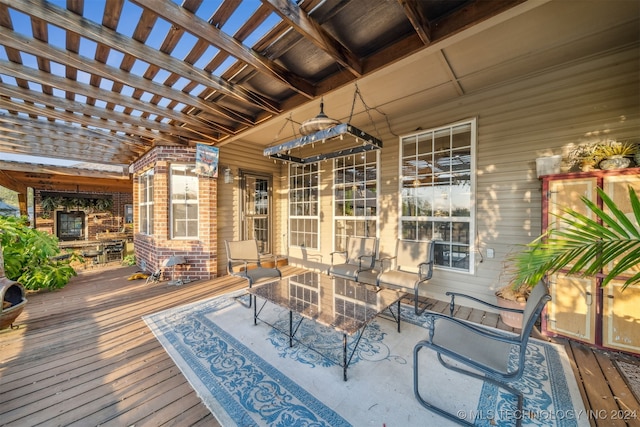 wooden deck featuring a pergola