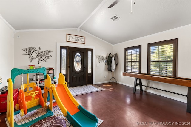 entrance foyer featuring lofted ceiling, crown molding, and ceiling fan