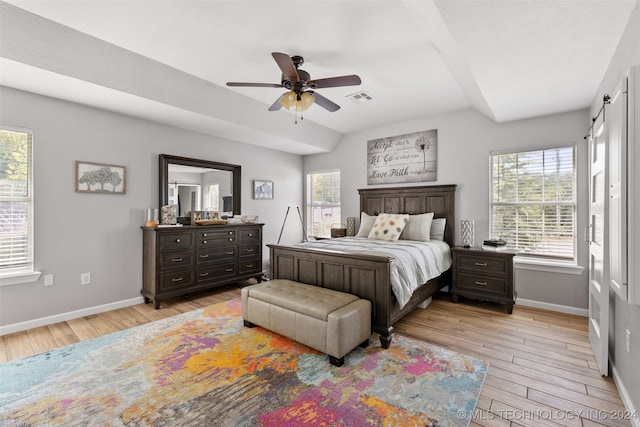 bedroom with ceiling fan and light hardwood / wood-style floors