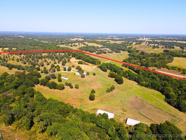 birds eye view of property featuring a rural view