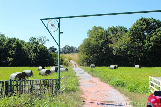 view of home's community with a lawn