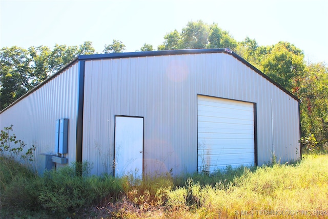 view of outbuilding with a garage