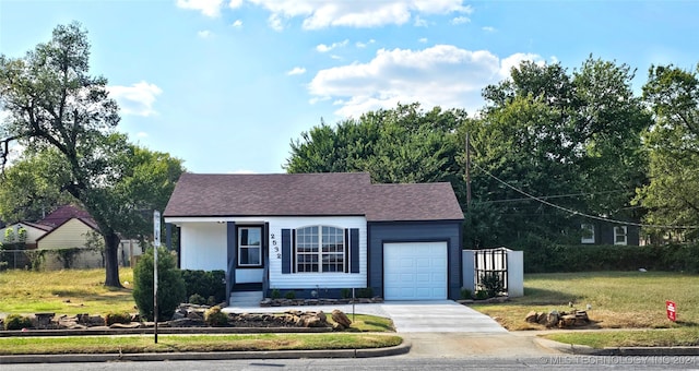 ranch-style house with a garage and a front lawn