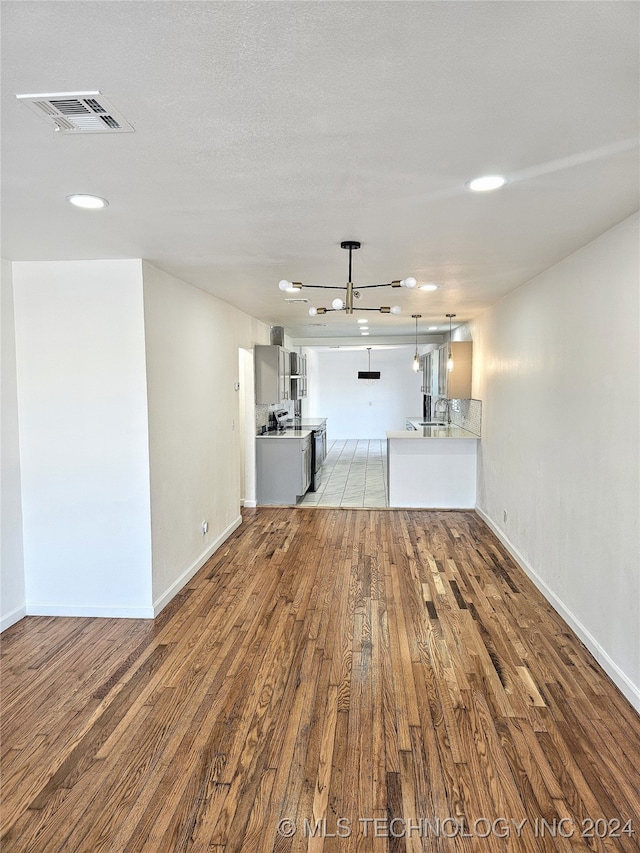 unfurnished living room featuring light hardwood / wood-style flooring