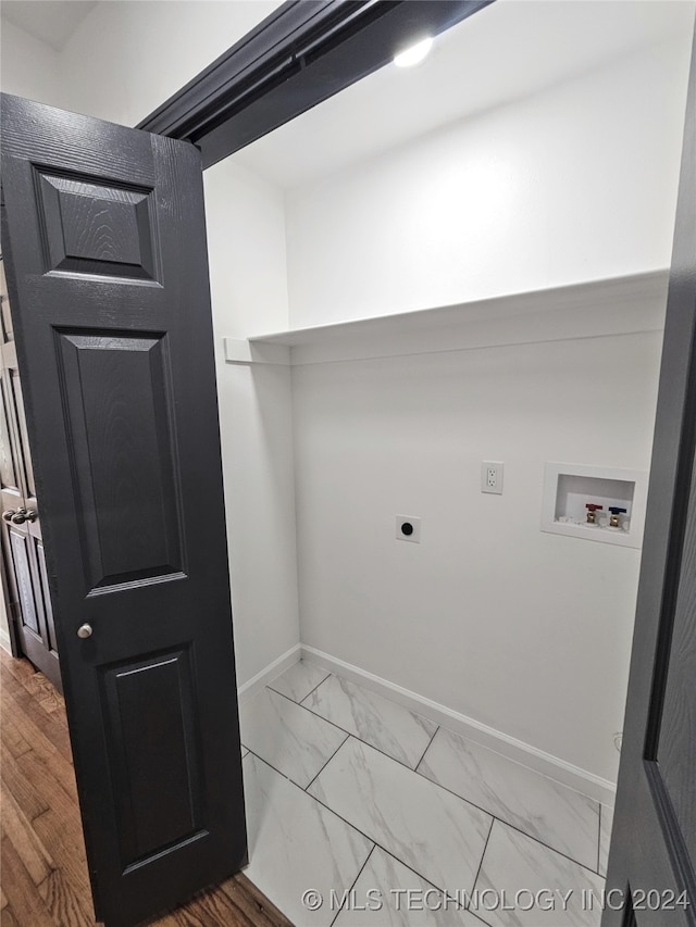 2532 N Martin Luther King Jr Blvd, Tulsa, OK 74106 - laundry room featuring washer hookup, baseboards, electric dryer hookup, and marble look tiles