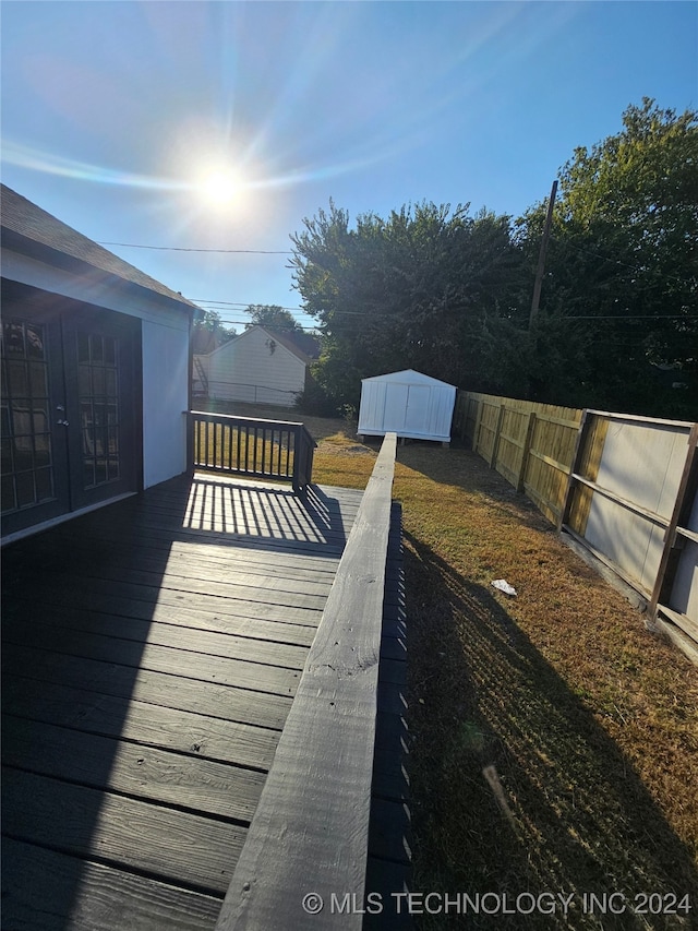 2532 N Martin Luther King Jr Blvd, Tulsa, OK 74106 - wooden deck featuring a fenced backyard and a shed