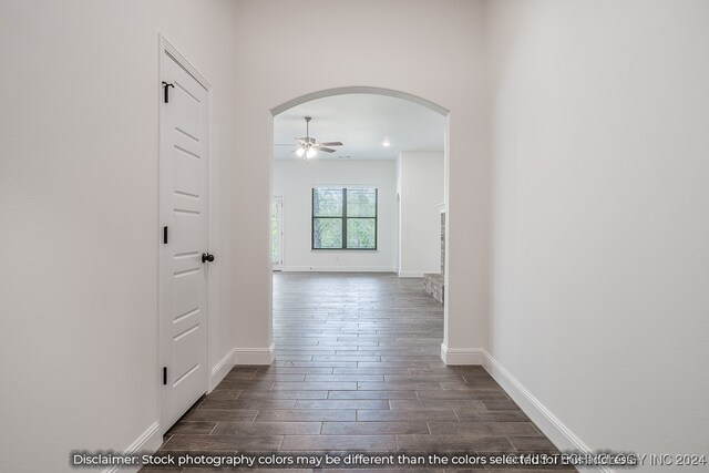 corridor featuring dark hardwood / wood-style floors