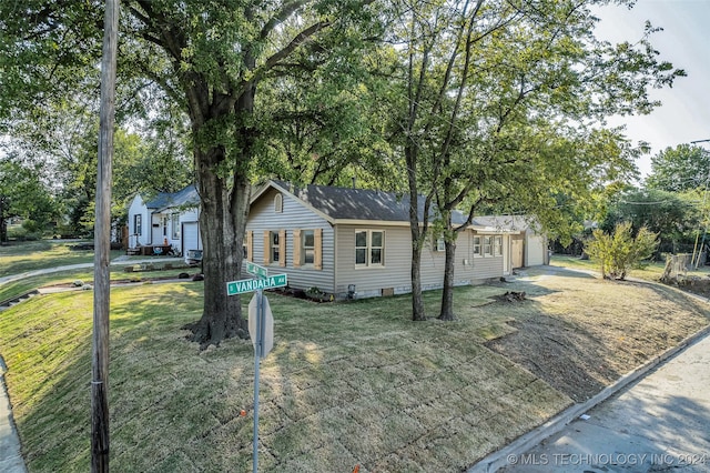 ranch-style home with a front yard