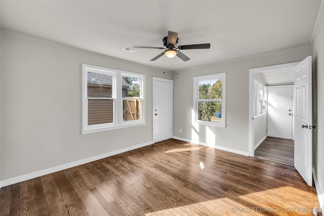 unfurnished room with crown molding, ceiling fan, and hardwood / wood-style floors