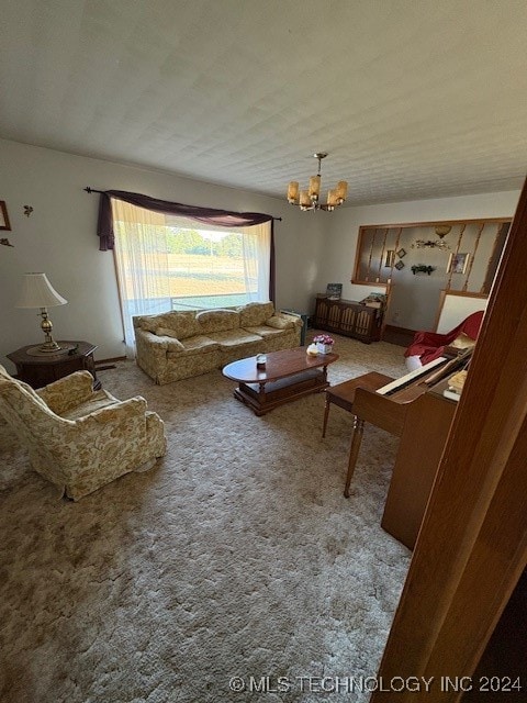 carpeted living room with a chandelier