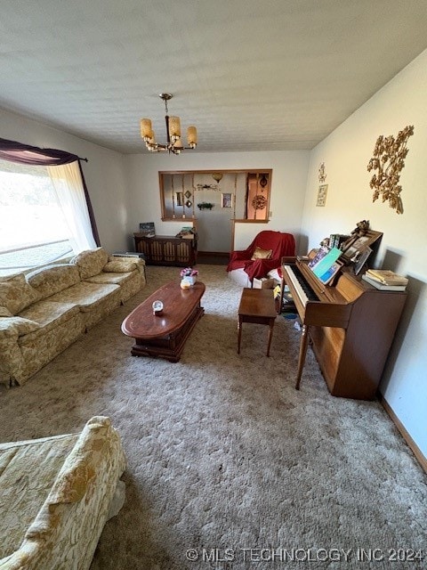 carpeted living room featuring a chandelier