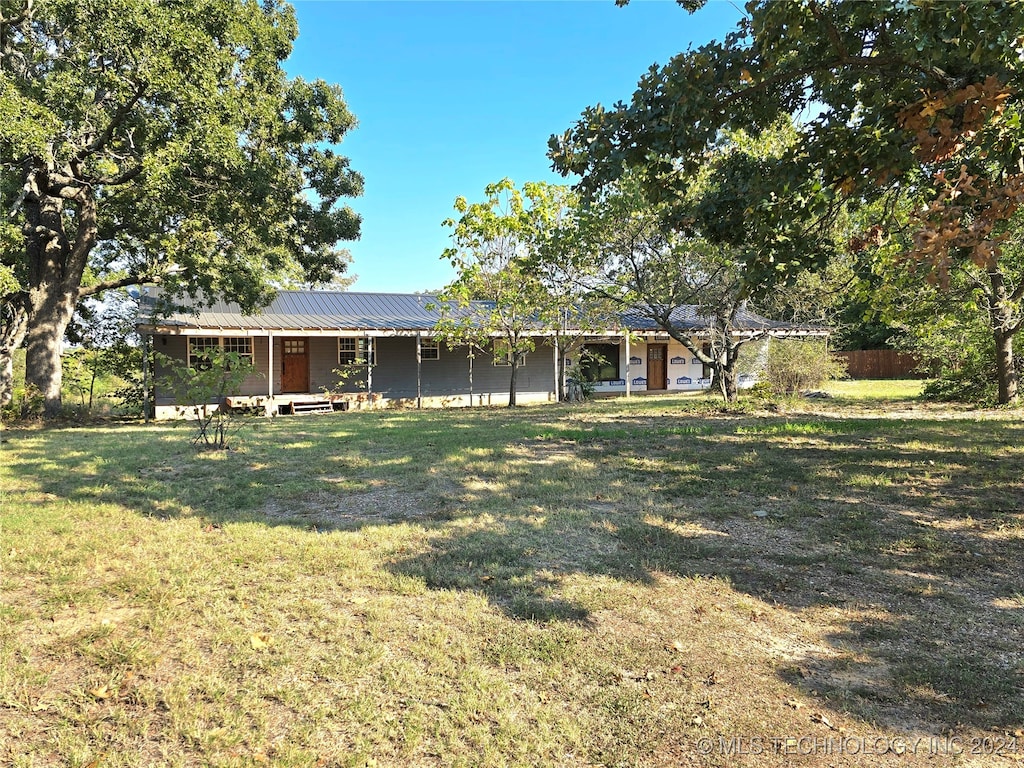 exterior space with a front lawn