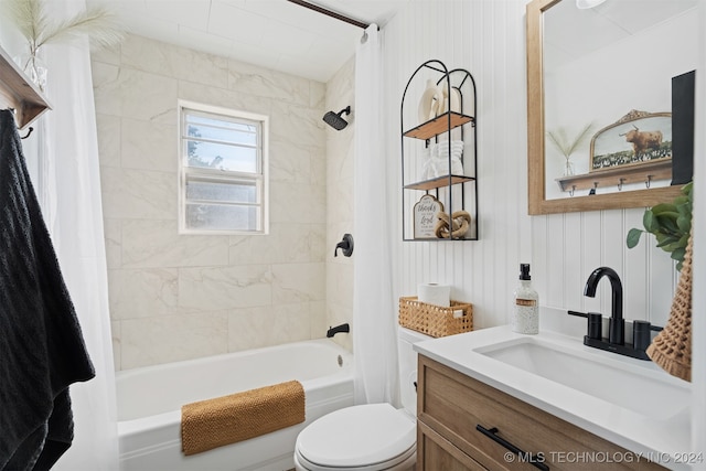 full bathroom featuring shower / tub combo, vanity, and toilet