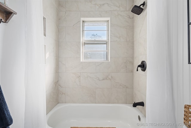 bathroom featuring shower / bath combination with curtain