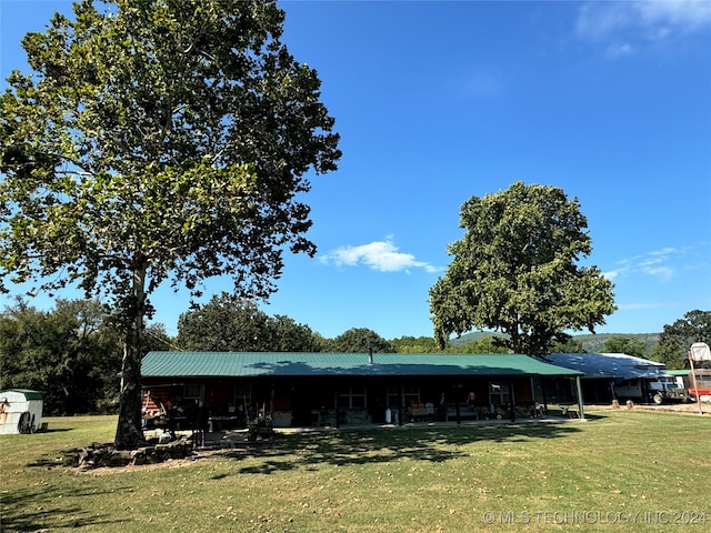 exterior space with a lawn